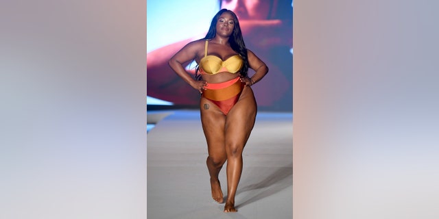 Brielle Anyea walks the runway during the 2019 Sports Illustrated Swimsuit Runway Show During Miami Swim Week At W South Beach - Runway at WET poolside lounge at W South Beach on July 14, 2019, in Miami Beach, Florida.