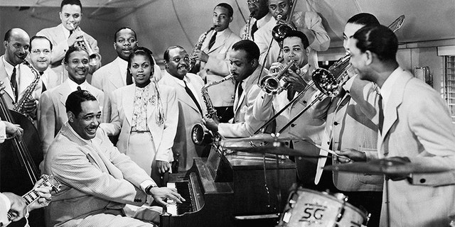 The Duke Ellington Orchestra performs 'Take the A Train' with singer Bette Roche in the film Reveille with Beverly, released January 1943.