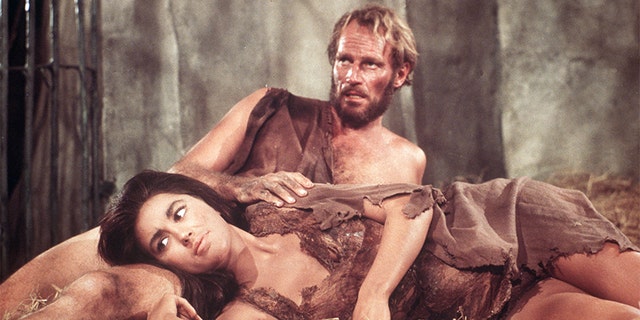 Charlton Heston and Linda Harrison on the set of 'Planet of the Apes.'