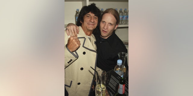 Ronnie Wood and Jamie Wood attend the launch party of Ronnie Woods Scream Gallery in Mayfair on May 20, 2006, in London, England.