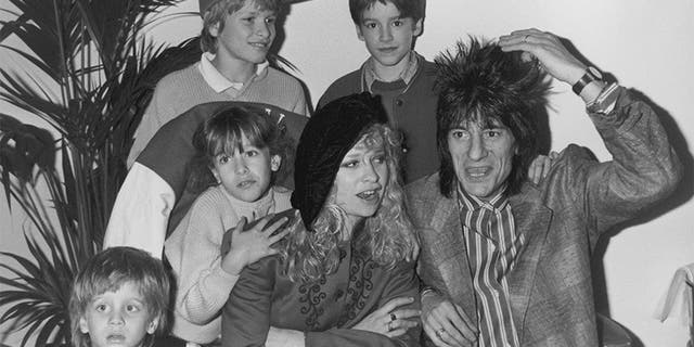 Rolling Stones guitarist Ronnie Wood with his then-wife Jo and their children, Jamie, Jesse, Tyrone and Leah, circa 1988.