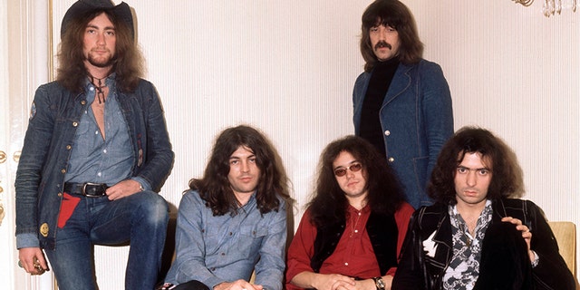 Roger Glover, Ian Gillan, Ian Paice, Jon Lord (standing at back) and Ritchie Blackmore.