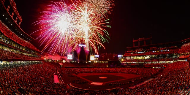 A general overhead view of Coors Field as fans fill the outfield during a fireworks show after a game between the Colorado Rockies and the San Francisco Giants at Coors Field on July 4, 2018 in Denver, Colorado.