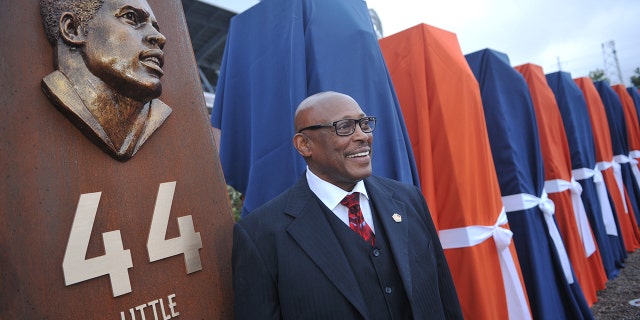 Pro Football Hall of Fame running back Floyd Little unveiled the sculpture at the Denver Broncos Ring of Fame Plaza in Sports Authority Field at Mile High. Denver, Colorado. September 27, 2013. The Plaza feature pillars honoring each of the 24 players in the Broncos Ring of Fame. (Photo by Hyoung Chang/The Denver Post via Getty Images)