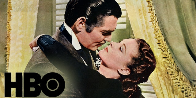 Rhett Butler (Clark Gable) embraces Scarlett O'Hara (Vivien Leigh) in a famous scene from the 1939 epic film Gone with the Wind.