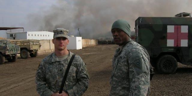 Sgt. First Class Heath Robinson, left, developed a rare form of deadly cancer after he was exposed to burn pits during a 13-month tour of duty in Iraq.