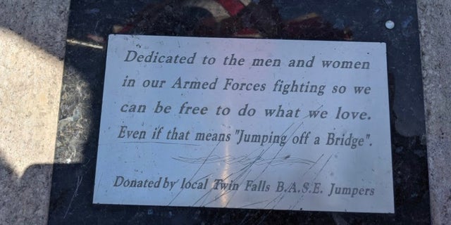 In the storied "drop zone" by the Perrine Bridge in Twin Falls stands an American Flag and a plaque in honor of U.S. troops.