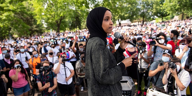 Rep. Ilhan Omar (D-MN) speaks to a crowd gathered for a march to defund the Minneapolis Police Department on June 6, 2020, in Minneapolis, Minnesota. The march commemorated the life of George Floyd who was killed by members of the MPD on May 25. (Photo by Stephen Maturen/Getty Images)