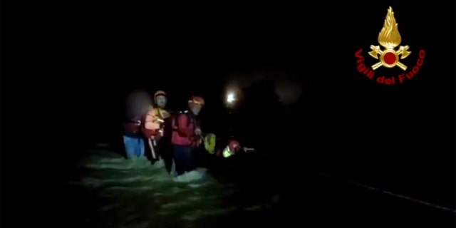 Three people were rescued late Monday after flash flooding in Italy.