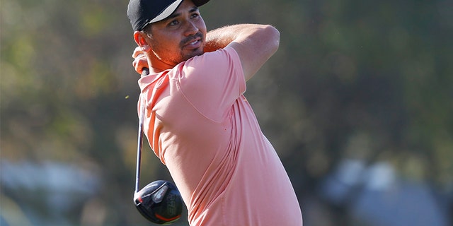 Jason Day playing his shot from the 12th tee during the first round of the Arnold Palmer Invitational Presented by MasterCard at the Bay Hill Club and Lodge on March 5, 2020, in Orlando. (Kevin C. Cox/Getty Images, File)