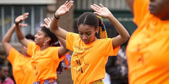 Members of the parade perform during the 48th Annual Juneteenth Day Festival on June 19, 2019 in Milwaukee, Wisconsin.