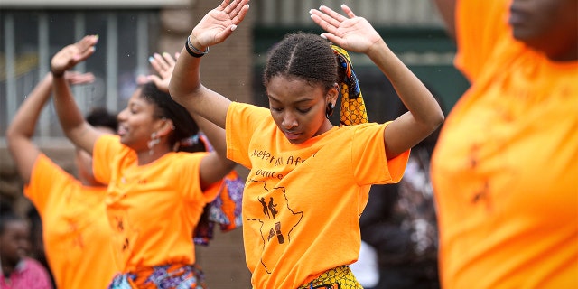 Members of the parade perform during the 48th Annual Juneteenth Day Festival on June 19, 2019 in Milwaukee, Wisconsin.