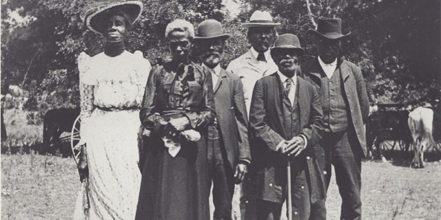 This June 19, 1900 file photo shows African Americans gathering in Texas for Emancipation Day, now known as Juneteenth.  The federal holiday commemorates the day in 1865 when slaves in Texas first learned that they had been freed by the Emancipation Proclamation, which was issued in 1863.