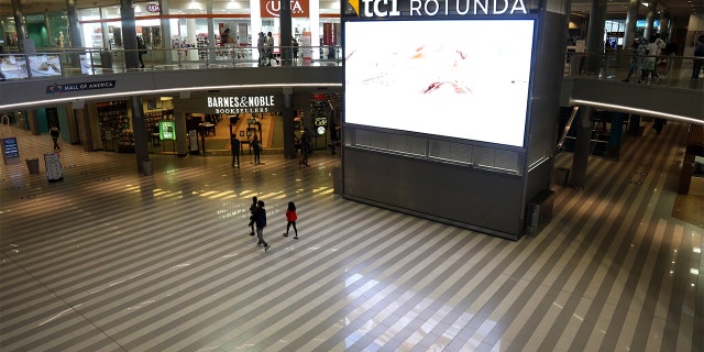 Shoppers walk through the Mall of America in Bloomington, Minnesota, U.S., on Wednesday, June 10, 2020. The mall went into lockdown Friday night amid reports of a shooting. 