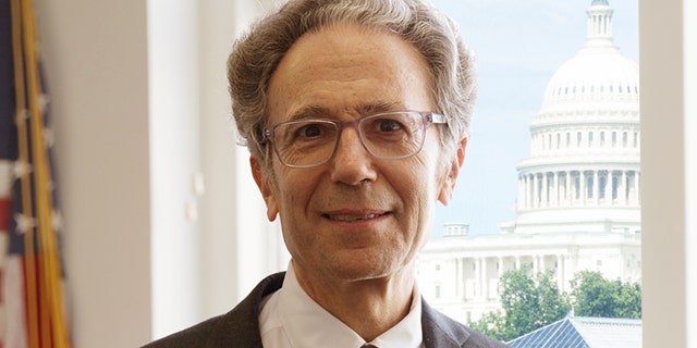 The first official photo of U.S. Agency for Global Media CEO Michael Pack in his office. (USAGM)