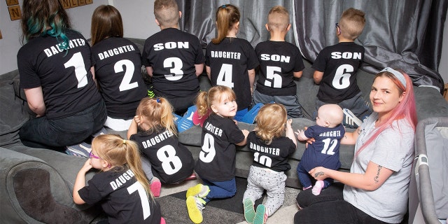 As the parent of eleven children, Nicole Sutton made shirts with numbers on them to help keep track of each of her children.