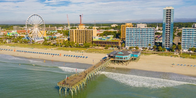 A 21-year-old Maryland man drowned in Myrtle Beach after helping to pull another swimmer's son out from a rip current, according to officials.