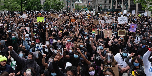 Protesters gather to protest the death of George Floyd at Foley Square, Tuesday, June 2, 2020, in New York. Floyd, a black man, died after being restrained by Minneapolis police officers on May 25.