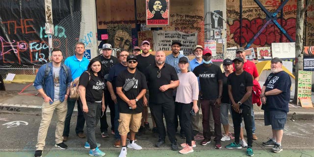 A group of evangelical pastors gather at Seattle's CHOP zone to pray and declare that they will defend houses of worship from any forms of attacks.