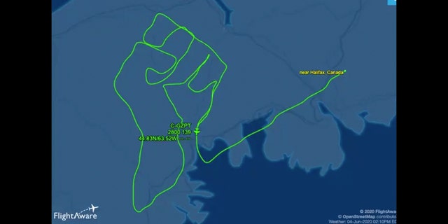 A Canadian pilot sent love from above by drawing a raised fist with his plane’s flight path to honor the late George Floyd and denounce racism.