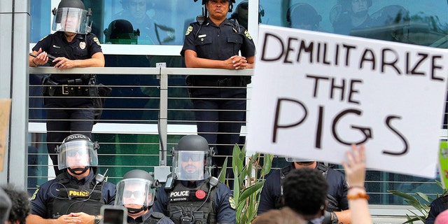 Protestors chanting in front of the Orlando Police Department this past Friday. (Joe Burbank/Orlando Sentinel via AP)