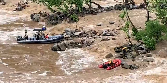 A dozen people had to be rescued from the rocks along the Potomac River on Saturday by rapidly rising waters.