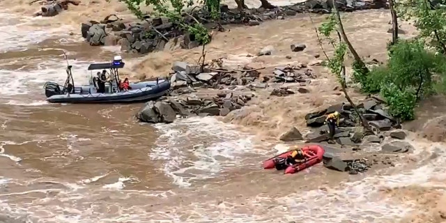 A dozen people had to be rescued from the rocks along the Potomac River on Saturday by rapidly rising waters.