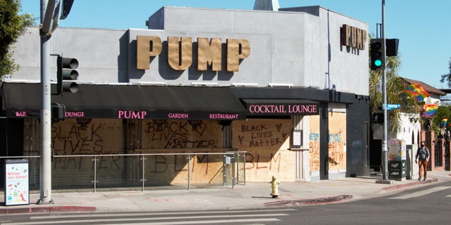 'Vanderpump Rules' main location, PUMP restaurant and bar owned by reality TV star Lisa Vanderpump, is seen with BLM messages and still boarded up after riots and protests happened after George Floyd's murder.