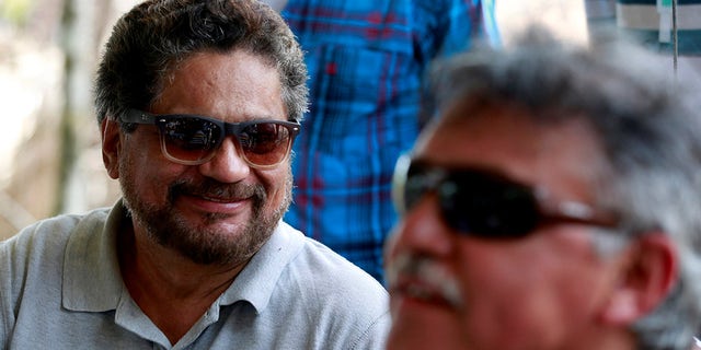 Ivan Marque (L) and Jesus Santrich, members of the Revolutionary Armed Forces of Colombia (FARC), talk to the media during the congress at the camp where they will ratify a peace deal with the government, near El Diamante in Yari Plains, Colombia, September 21, 2016. REUTERS /John Vizcaino - S1BEUCPYDBAA