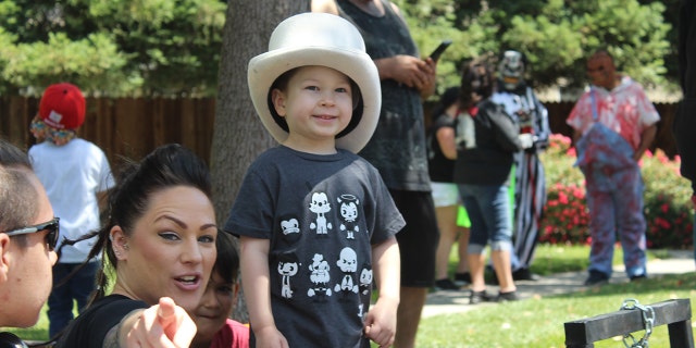 Brodie was able to keep the hat from one of his favorite clowns, Blanco, who was unable to attend the parade.