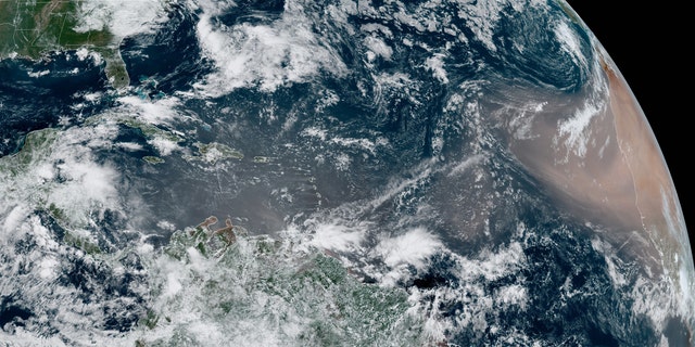 A dust cloud from the Sahara swirls west over the Atlantic Ocean on June 17.