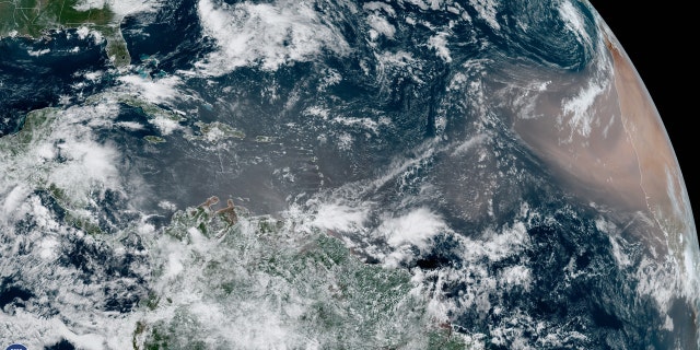 A dust cloud from the Sahara swirls west over the Atlantic Ocean on June 17.