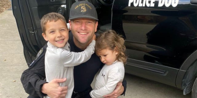San Diego Police Department K9 Officer Jonathan Wiese with his own young son and daughter. (San Diego Police Department)
