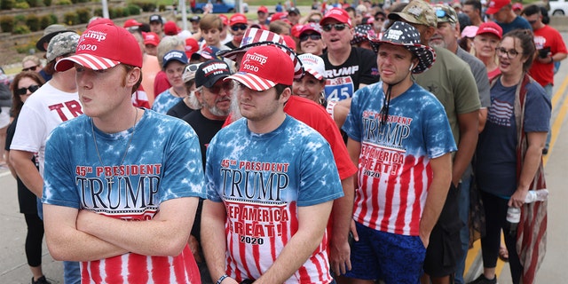 Supporters of U.S. President Donald Trump gather to attend a campaign rally at the BOK Center, June 20, 2020 in Tulsa, Oklahoma. Trump is scheduled to hold his first political rally since the start of the coronavirus pandemic at the BOK Center on Saturday while infection rates in the state of Oklahoma continue to rise.