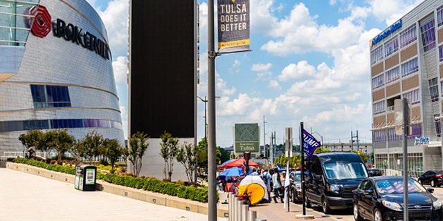 People camp outside of the BOK Center ahead of a rally for U.S. President Donald Trump in Tulsa, Oklahoma, U.S., on Wednesday, June 17, 2020. Trump's resumption of his signature campaign rallies this week is intensifying criticism of his response to the biggest domestic crises of his presidency: The deadly coronavirus pandemic and widening protests over police brutality against Black Americans. Photographer: Christopher Creese/Bloomberg via Getty Images
