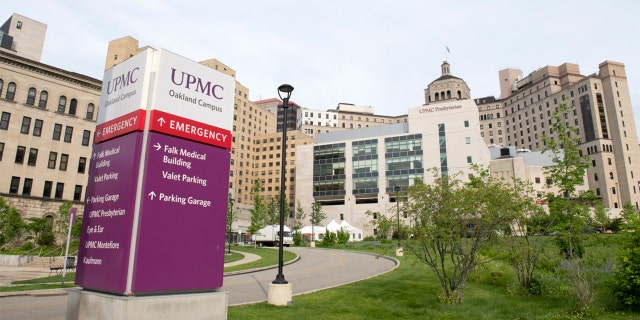 Pittsburgh, USA - May 23, 2019. Entrance sign of medical building at UPMC Oakland Campus in University of Pittsburgh, Pennsylvania, USA