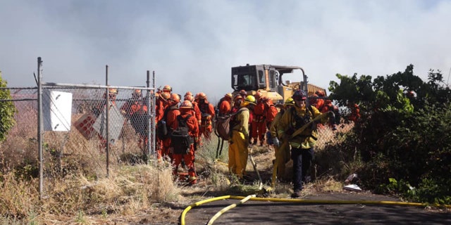 Several homes were destroyed after a wildfire erupted Wednesday in a California neighborhood.