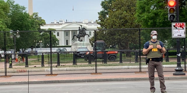 A nearly eight-foot high chain link fence was installed outside the White House, preventing individuals from being able to get into Lafayette Square--the scene of protests that turned violent in recent days. (Mark Meredith/FNC)