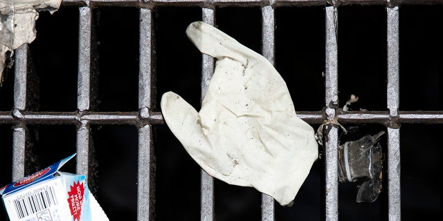 Firearm violence in Philadelphia almost doubles after COVID-19 lockdown measures: report 3 This Monday, May 25, 2020 photo shows a discarded glove on a storm drain in Philadelphia. (AP Photo/Matt Rourke)