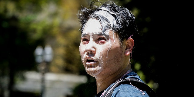PORTLAND, OR - JUNE 29: Andy Ngo, a Portland-based journalist, is seen covered in unknown substance after unidentified Rose City Antifa members attacked him on June 29, 2019 in Portland, Oregon. Several groups from the left and right clashed after competing demonstrations at Pioneer Square, Chapman Square, and Waterfront Park spilled into the streets. According to police, medics treated eight people and three people were arrested during the demonstrations. (Photo by Moriah Ratner/Getty Images)