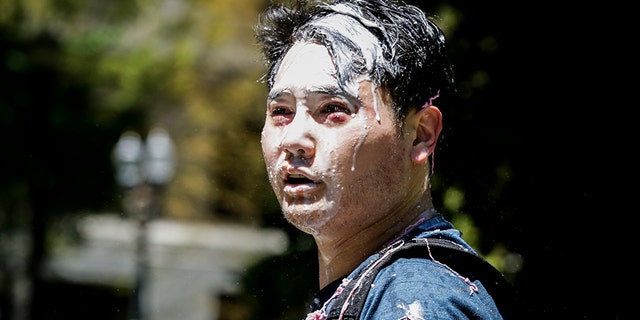 Andy Ngo, a Portland-based journalist, is seen covered in an unknown substance after unidentified Rose City Antifa members attacked him on June 29, 2019 in Portland, Oregon.