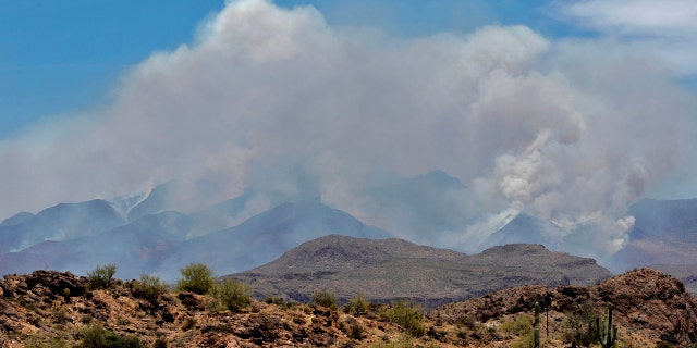 The wildfire, which has prompted evacuations in three rural communities and closed parts of two state highways, has grown dramatically in size from 59 square miles to 101 square miles as of Tuesday morning officials said.
