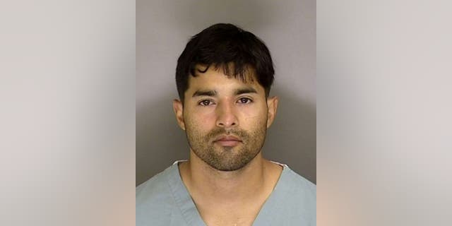 This booking photo from the Santa Cruz County Sheriff's Office shows Steven Carrillo. Carrillo, an Air Force sergeant, is accused of killing two law enforcement officers in California last year was part of a right-wing militia known as the Grizzly Scouts that held firearms trainings, scouted protests, and laid out terms of "war" against police, a newspaper reported Monday. (AP/Santa Cruz Sheriff's Office)