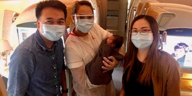 Nurses Christine Anne and John were being repatriated from the Carnival Breeze cruise ship on Saturday when they helped deliver a baby at 37,000 feet.