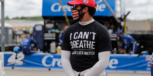 Bubba Wallace wears a "I Can't Breath, Black Lives Matter" shirt before a NASCAR Cup Series race at Atlanta Motor Speedway, June 7, 2020, in Hampton, Georgia.