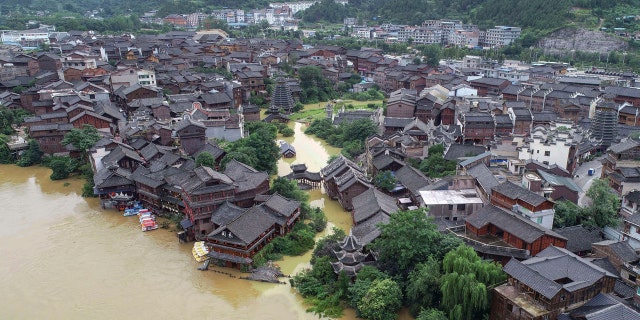 An aerial view shows the ancient town of Xiasi during flooding in Kaili city in southwest China's Guizhou province, June 23.