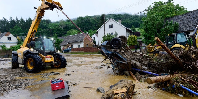 At least one person died, another is missing and dozens were rescued amid flash flooding in the northeastern Czech Republic.