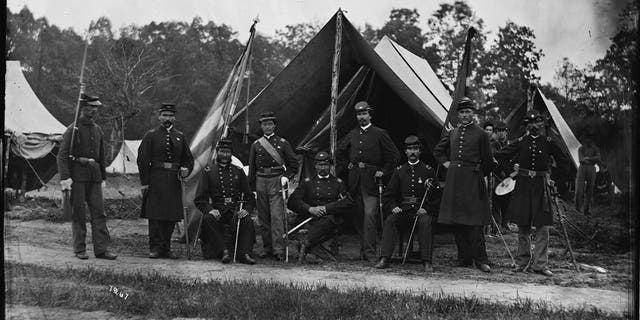 Field and staff officers of the 69th Pennsylvania Infantry, a volunteer regiment in the Union army, at Gettysburg, Pennsylvania during the American Civil War, June 1865. Photo by William Morris Smith.  