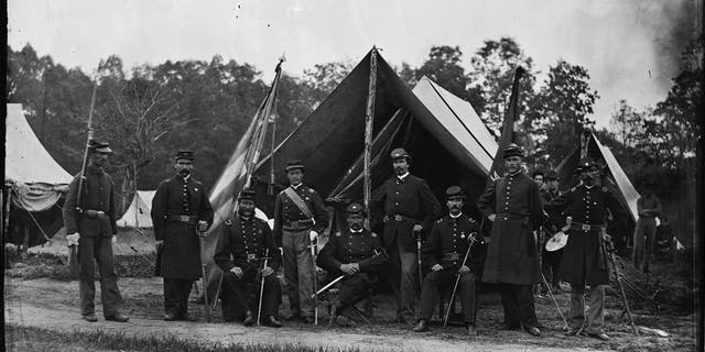 Field and staff officers of the 69th Pennsylvania Infantry, a volunteer regiment in the Union army, at Gettysburg, Pennsylvania during the American Civil War, June 1865. Photo by William Morris Smith.  