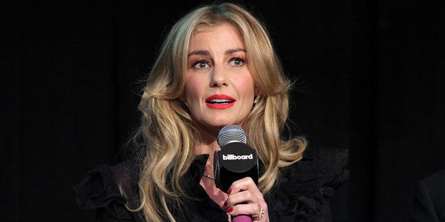 Faith Hill discussed her time singing the National Anthem at the Super Bowl in 2000.